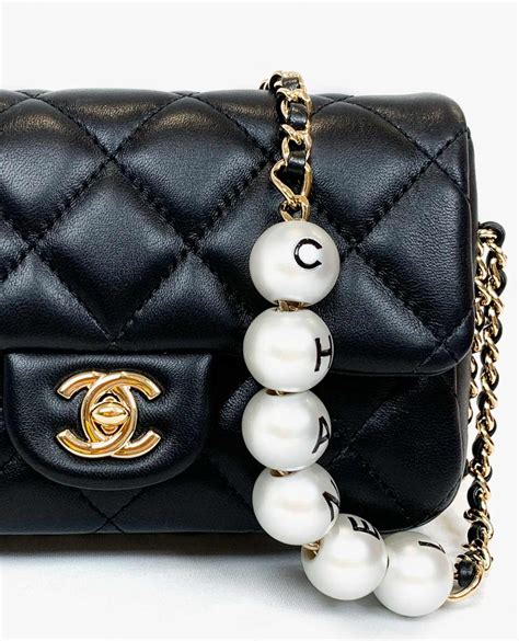 chanel pearl strap bag